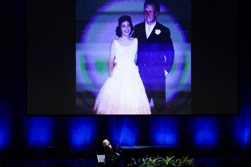 Singer-songwriter and environmentalist Carole King performs "In the Name of Love" during a memorial service for former Senate Majority Leader Harry Reid at the Smith Center in Las Vegas, Saturday, Jan. 8, 2022.(AP Photo/John Locher)