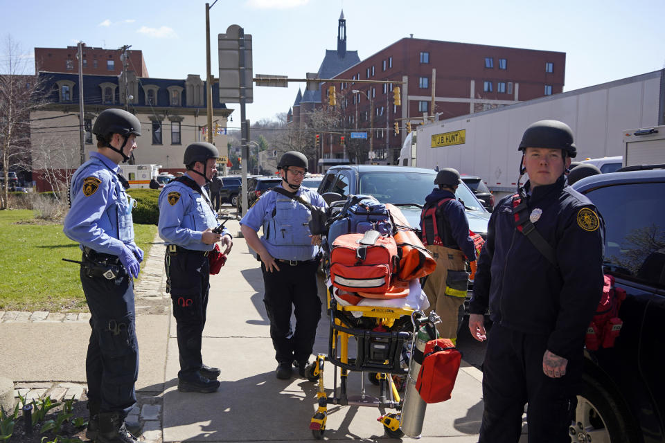 Pittsburgh Police and paramedics respond to Pittsburgh Central Catholic High School for what turned out to be a hoax report of an active shooter, on Wednesday, March 29, 2023 in the Oakland neighborhood of Pittsburgh. (AP Photo/Gene J. Puskar)