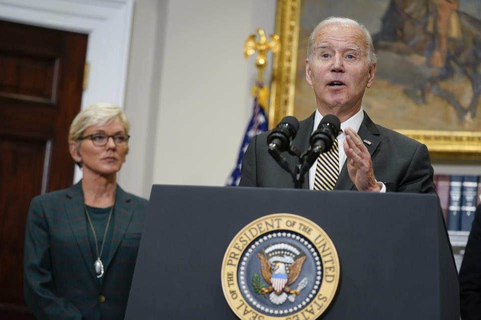 Energy Secretary Jennifer Granholm listens as President Joe Biden speaks about energy and the Strategic Petroleum Reserve during an event in the Roosevelt Room of the White House, Wednesday, Oct. 19, 2022, in Washington. (AP Photo/Evan Vucci)
