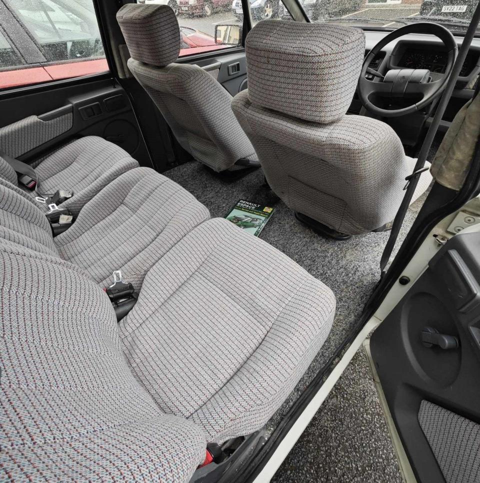 Grey, boxy interior of early Renault Espace