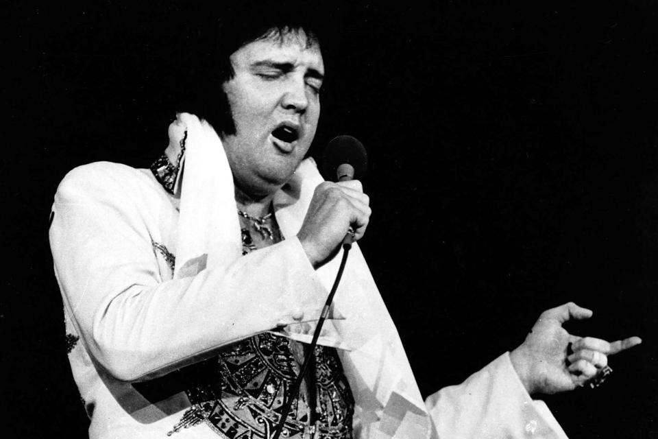 Elvis Presley performs in Providence, Rhode Island, on May 23, 1977, months before his death at 42.