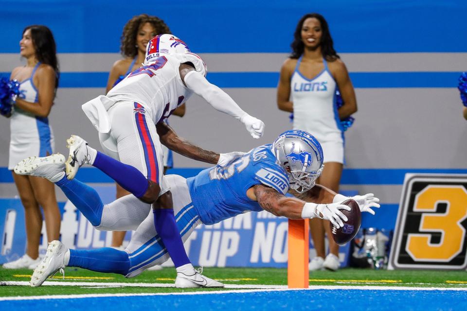 Detroit Lions running back Craig Reynolds (46) scores a touchdown against the Buffalo Bills during the second half of the preseason game at Ford Field in Detroit on Friday, Aug. 13, 2021.