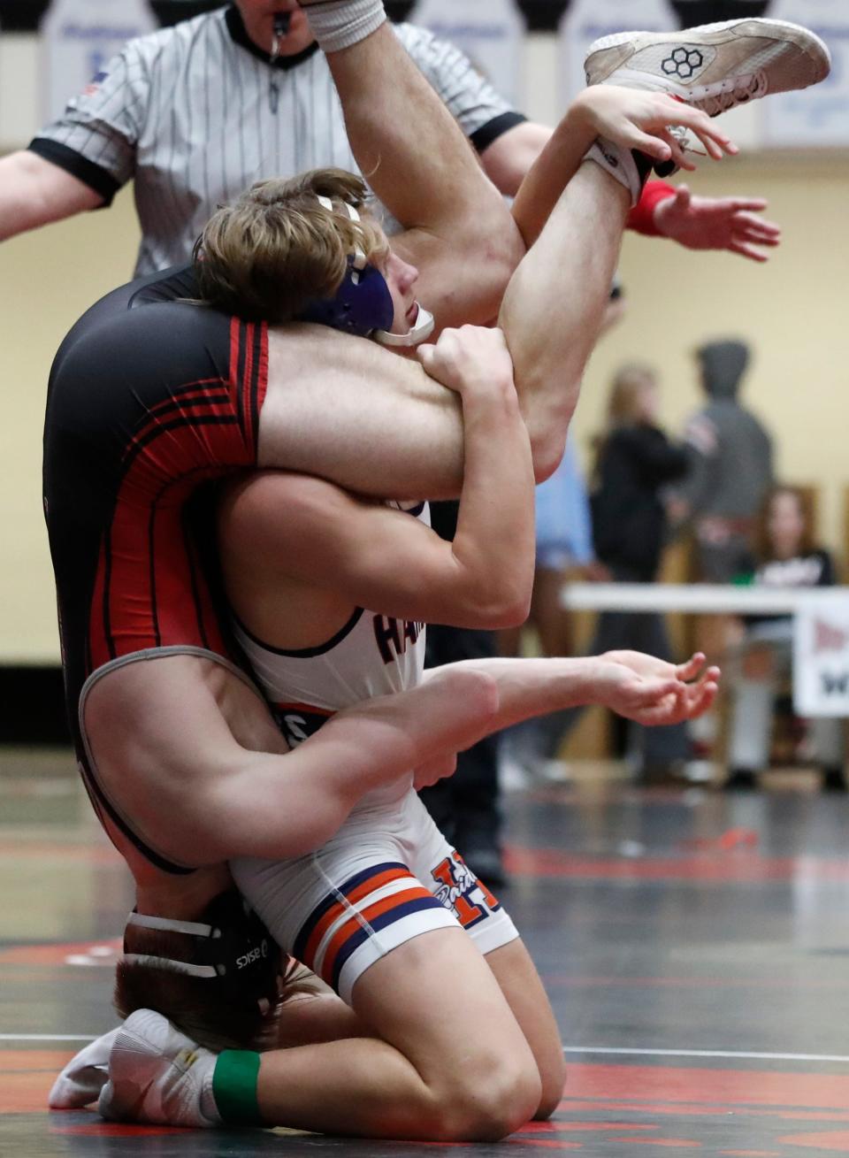 Harrison Carter Heriges wrestles Attica Boden Rice during the IHSAA wrestling sectionals meet, Saturday, Jan. 27, 2024, at Lafayette Jeff High School in Lafayette, Ind.