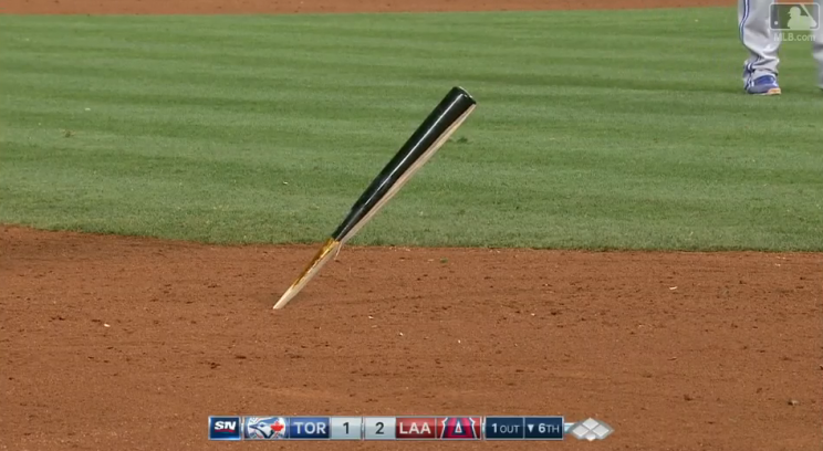 The bat that Chris Coghlan dodged was so sharp that it stuck right in the ground. (MLB.TV)