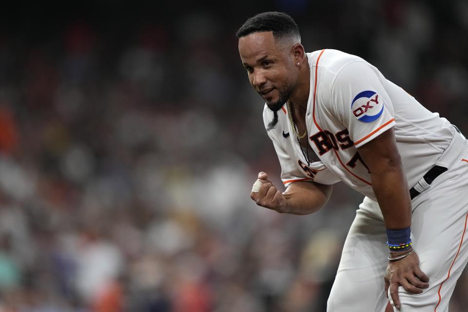 Houston Astros' Jose Abreu gestures toward the dugout after the second inning of a baseball game against the Washington Nationals Tuesday, June 13, 2023, in Houston. Abreu hit a double during the second inning which was his 1,500th career hit. (AP Photo/David J. Phillip)