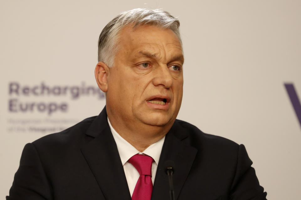 Hungary's Prime Ministers Viktor Orban addresses media at a news briefing in Budapest, Hungary, Tuesday, Nov. 23, 2021. The leaders of the Visegrad Four group of Central European countries met in Hungary's capital of Budapest Tuesday to discuss the ongoing migration crisis along Poland's border with Belarus. (AP Photo/Laszlo Balogh)