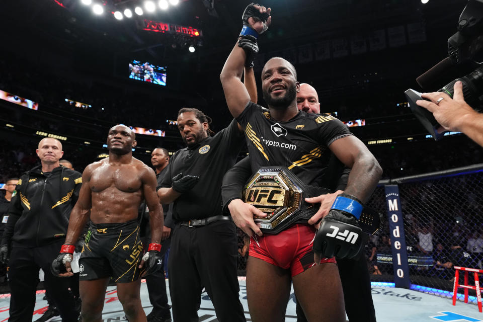 SALT LAKE CITY, UTAH - AUGUST 20: (R-L) Leon Edwards of Jamaica reacts after defeating Kamaru Usman of Nigeria in the UFC welterweight championship fight during the UFC 278 event at Vivint Arena on August 20, 2022 in Salt Lake City, Utah. (Photo by Josh Hedges/Zuffa LLC)