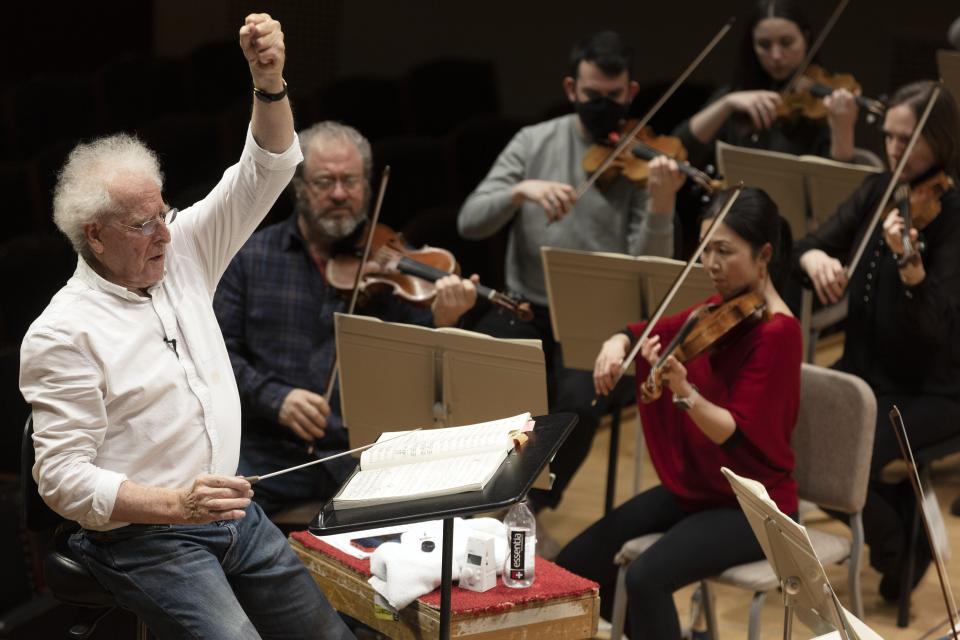 Benjamin Zander conducts the Boston Philharmonic Orchestra during a rehearsal of Beethoven's Ninth Symphony at Symphony Hall, Sunday, Feb. 19, 2023, in Boston. (AP Photo/Michael Dwyer)