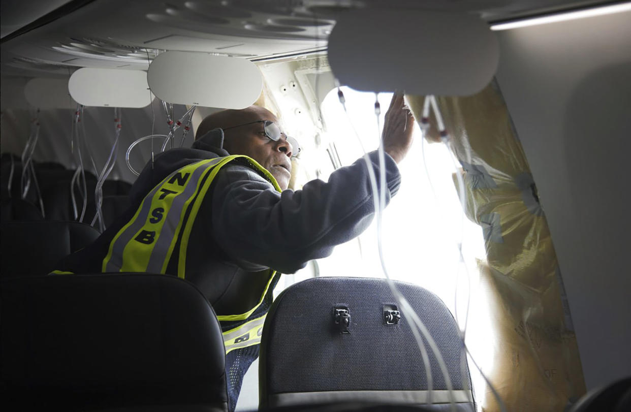 A panel used to plug an area reserved for an exit door on the Boeing 737 Max 9 jetliner blew out Friday night shortly after the flight took off from Portland, forcing the plane to return to Portland International Airport.  (National Transportation Safety Board via AP)