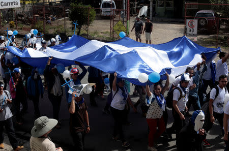 Nicaraguan expats living in Costa Rica take part in the "Caravan for Liberty and Justice" to protest against the government of Nicaraguan President Daniel Ortega, in La Cruz, Costa Rica border with Nicaragua, December 16, 2018. REUTERS/Juan Carlos Ulate