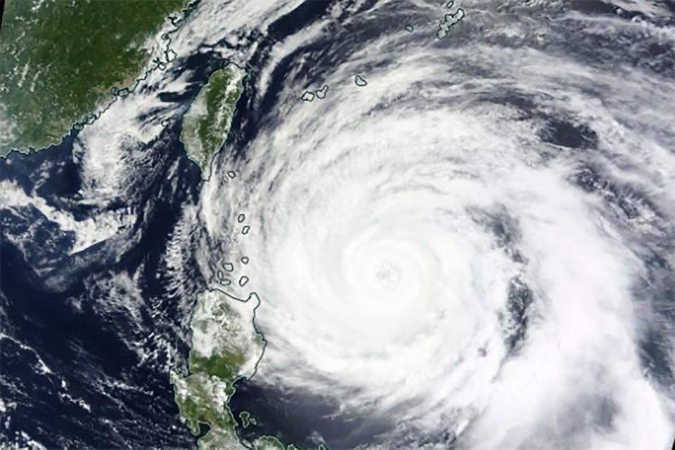 Nasa satellite image shows Mawar over the Philippines, Tawain and southern islands of Japan (AP)