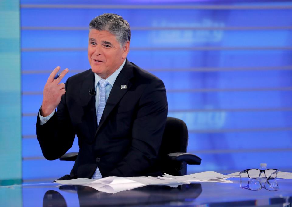 Fox News talk show host Sean Hannity interviews Roseanne Barr during a taping of his show on July 26, 2018.