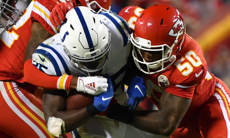 Kansas City Chiefs linebacker Darron Lee in on a tackle of Indianapolis Colts running back Marlon Mack.
