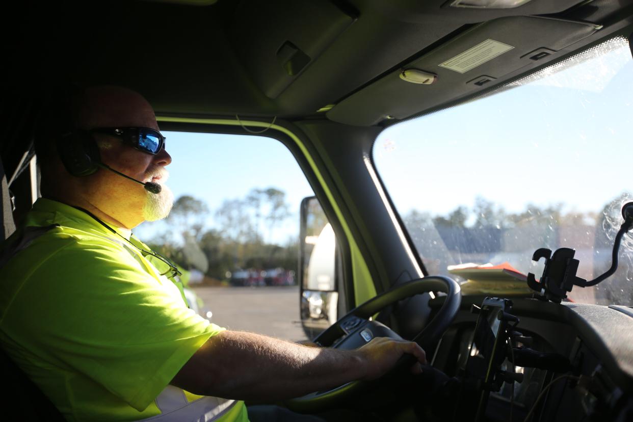 Daniel Withers transports 20 tons of chemicals in his tank, Dec. 18, 2023.