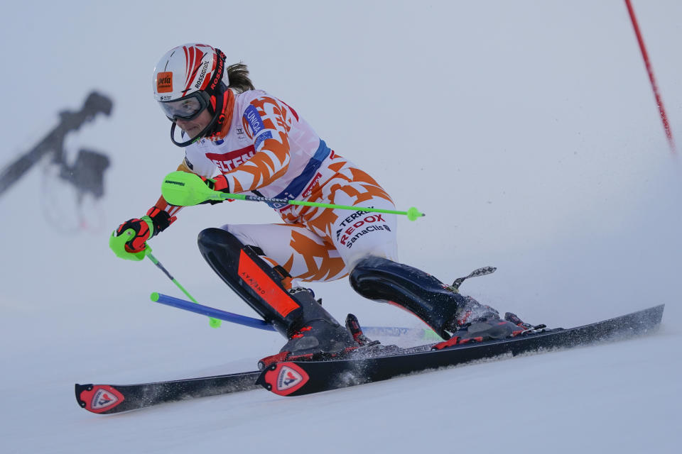 Slovakia's Petra Vlhova speeds down the course during the first run of an alpine ski World Cup women's slalom race, in Levi, Finland, Saturday, Nov. 11, 2023. (AP Photo/Giovanni Auletta)