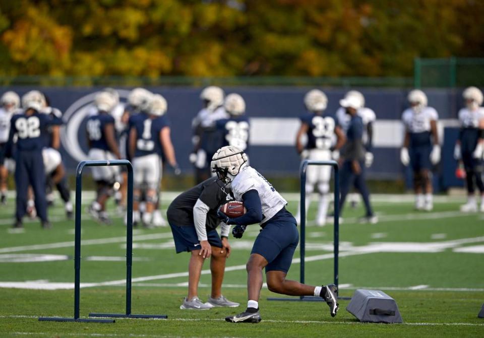 Penn State running back Nick Singleton runs a drill during practice on Wednesday, October. 25, 2023.