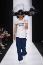 <p>Another model wears the political statement tee that reads “Save the Date, 18.03.18” at the Atelier Gala B runway show during Mercedes-Benz Fashion Week Russia. (Photo: Getty Images) </p>