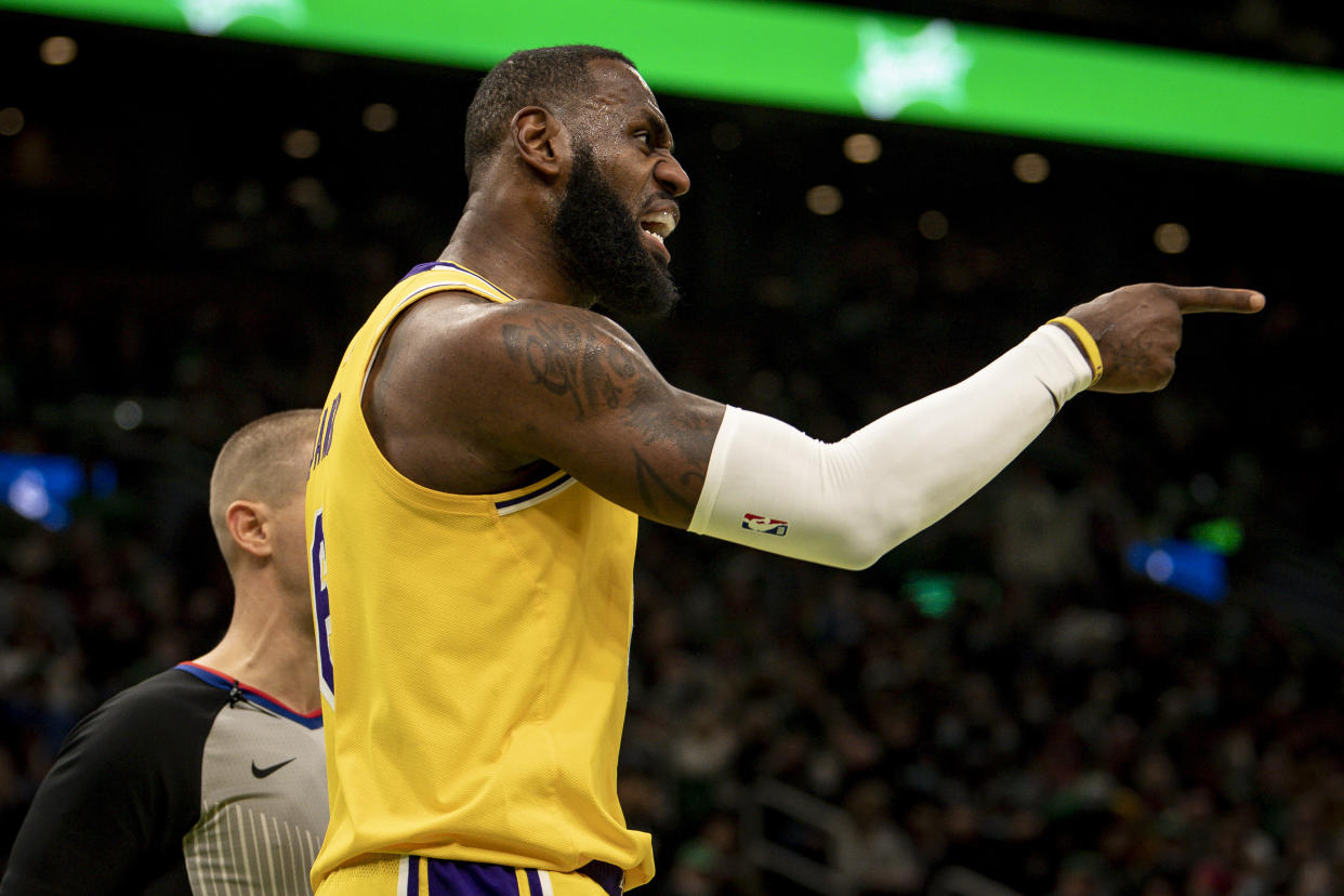 Lakers star LeBron James reacts after scoring during the first half against the Celtics at TD Garden on Friday. (Maddie Malhotra/Getty Images)