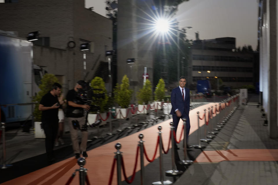 Spain's Prime Minister and Socialist candidate Pedro Sanchez arrives at a televised live debate ahead of Spain's general election in Madrid, Spain, Wednesday, July 19, 2023. Spain's elections Sunday will be a battle between two leftist and two rightist parties that are teaming up to form possible coalitions. Pedro Sánchez, Spain's prime minister since 2018, is facing re-election with recent ballots and most of polls against him. (AP Photo/Bernat Armangue)