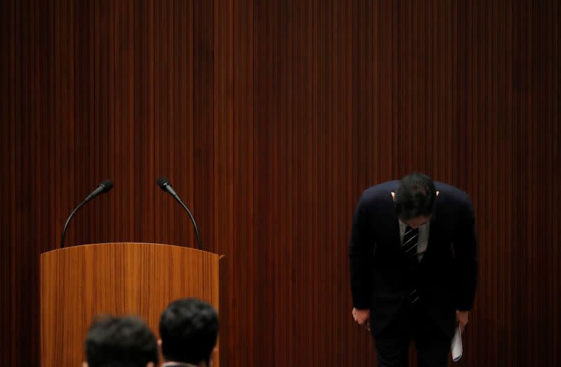 Samsung Electronics Vice Chairman, Jay Y. Lee, bows during a news conference at a company's office building in Seoul