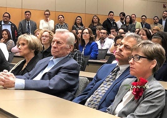 Jack Cardwell, left, and his son Jim Cardwell and his wife Julie attend a ceremony In March 2019 at the Texas Tech University Health Sciences Center El Paso campus honoring the Cardwell family's $750,000 donation to the school.