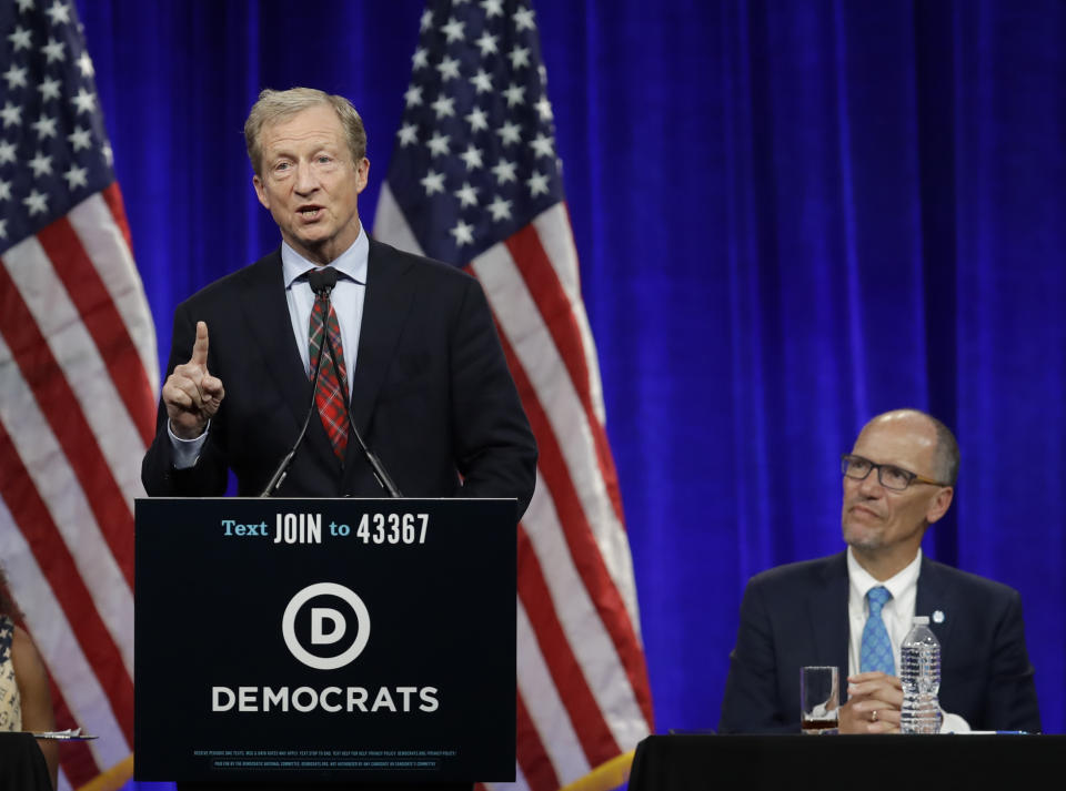 Democratic presidential candidate Tom Steyer gestures while speaking at the Democratic National Committee's summer meeting Friday, Aug. 23, 2019, in San Francisco. More than a dozen Democratic presidential hopefuls are making their way to California to curry favor with national party activists from around country. Democratic National Committee members will hear Friday from top contenders, including Elizabeth Warren, Kamala Harris and Bernie Sanders. (AP Photo/Ben Margot)