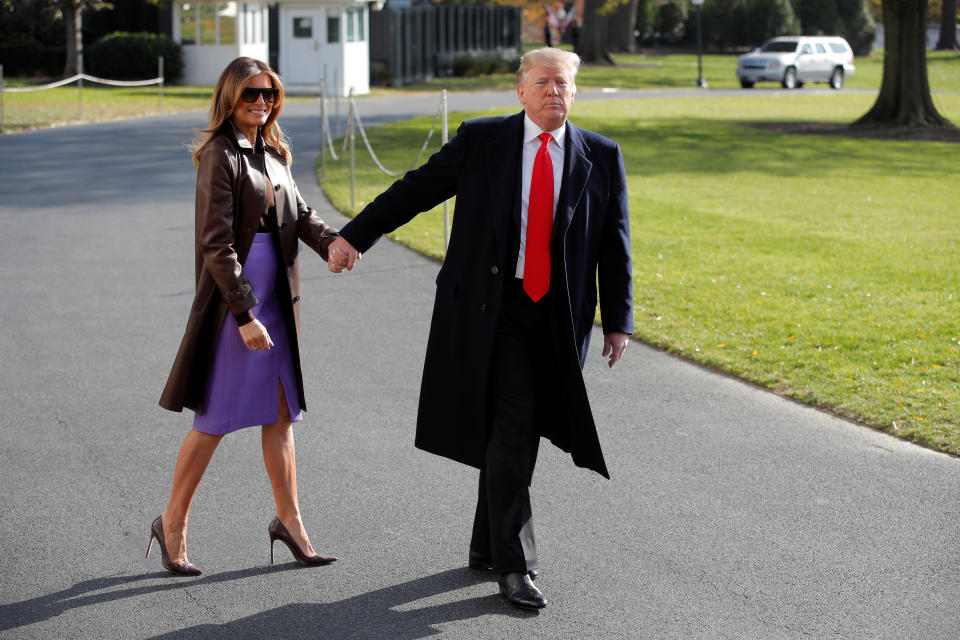 President Trump and first lady Melania Trump leave the White House to travel to the G-20 summit in Argentina Thursday. (Photo: Jim Young/Reuters)