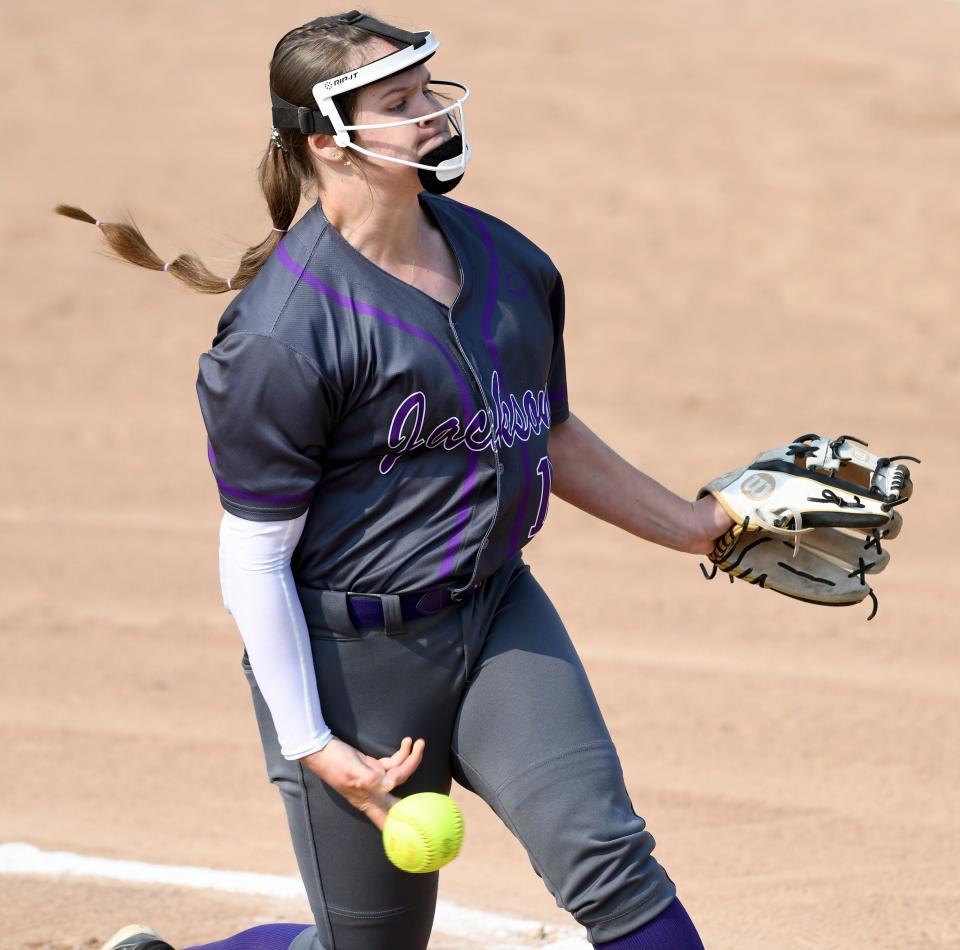 Jackson's Julia Gossett delivers a pitch against Hoover in the first inning of the Division I district final in Massillon, Wednesday, May 17, 2023.