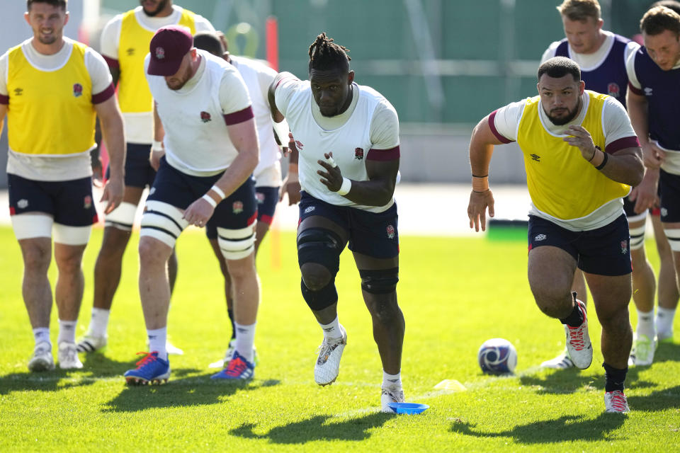 England's Maro Itoje, centre, attends a training session at the Georges Carcassonne stadium in Aix-en-Provence, France, Tuesday, Oct. 10, 2023. England will face Fiji on Sunday, Oct.15, 2023, in the Rugby World Cup quarterfinals. (AP Photo/Pavel Golovkin)