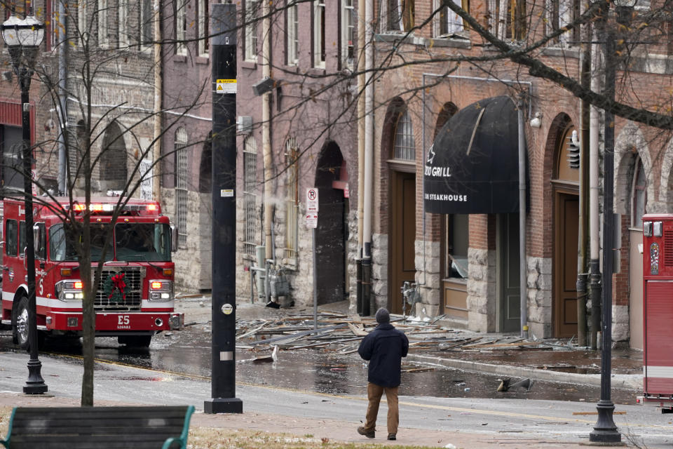 Debris scattered near the scene of an explosion in downtown Nashville, Tenn., Friday, Dec. 25, 2020. Buildings shook in the immediate area and beyond after a loud boom was heard early Christmas morning.(AP Photo/Mark Humphrey)