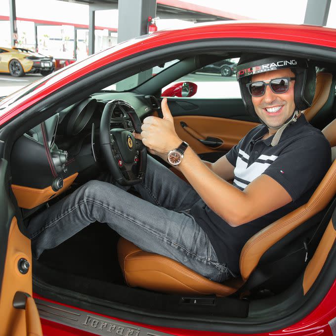 A man driving a Ferrari from Virgin Experience Gifts