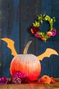 <p>A pair of cutout wings take this pumpkin from basic to batty. First, paint your squash white and allow it to dry. Then mix a <a href="https://www.amazon.com/dp/B00889ZCOO?tag=syn-yahoo-20&ascsubtag=%5Bartid%7C10055.g.1714%5Bsrc%7Cyahoo-us" rel="nofollow noopener" target="_blank" data-ylk="slk:small amount of orange;elm:context_link;itc:0;sec:content-canvas" class="link ">small amount of orange</a> into white paint. Brush on a few inches from the top. Gradually add more color until you reach full saturation in the middle. Start adding <a href="https://www.amazon.com/dp/B00889ZBW2/?tag=syn-yahoo-20&ascsubtag=%5Bartid%7C10055.g.1714%5Bsrc%7Cyahoo-us" rel="nofollow noopener" target="_blank" data-ylk="slk:magenta;elm:context_link;itc:0;sec:content-canvas" class="link ">magenta</a> and do the same. Finish with a solid base. Next, <a href="https://www.goodhousekeeping.com/holidays/halloween-ideas/a34444/batwings-pdf/" rel="nofollow noopener" target="_blank" data-ylk="slk:cut bat wings out of cardstock;elm:context_link;itc:0;sec:content-canvas" class="link ">cut bat wings out of cardstock</a>. Glue chopsticks or skewers to backs of wings, then stick into pumpkin once paint is dry.</p><p><a class="link " href="https://www.amazon.com/Creative-Inspirations-Acrylic-Paint-Free-Flowing/dp/B07BVZ3DQW/ref=sr_1_2_sspa?tag=syn-yahoo-20&ascsubtag=%5Bartid%7C10055.g.1714%5Bsrc%7Cyahoo-us" rel="nofollow noopener" target="_blank" data-ylk="slk:SHOP PAINT;elm:context_link;itc:0;sec:content-canvas">SHOP PAINT</a><br></p>