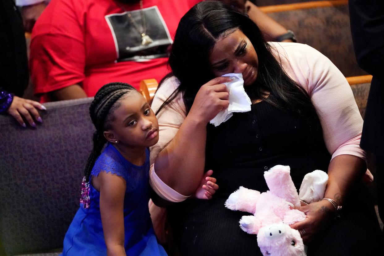 Roxie Washington (R) and Gianna Floyd, daughter of George Floyd, attend his funeral service in the chapel at the Fountain of Praise church on June 9, 2020 in Houston, Texas.