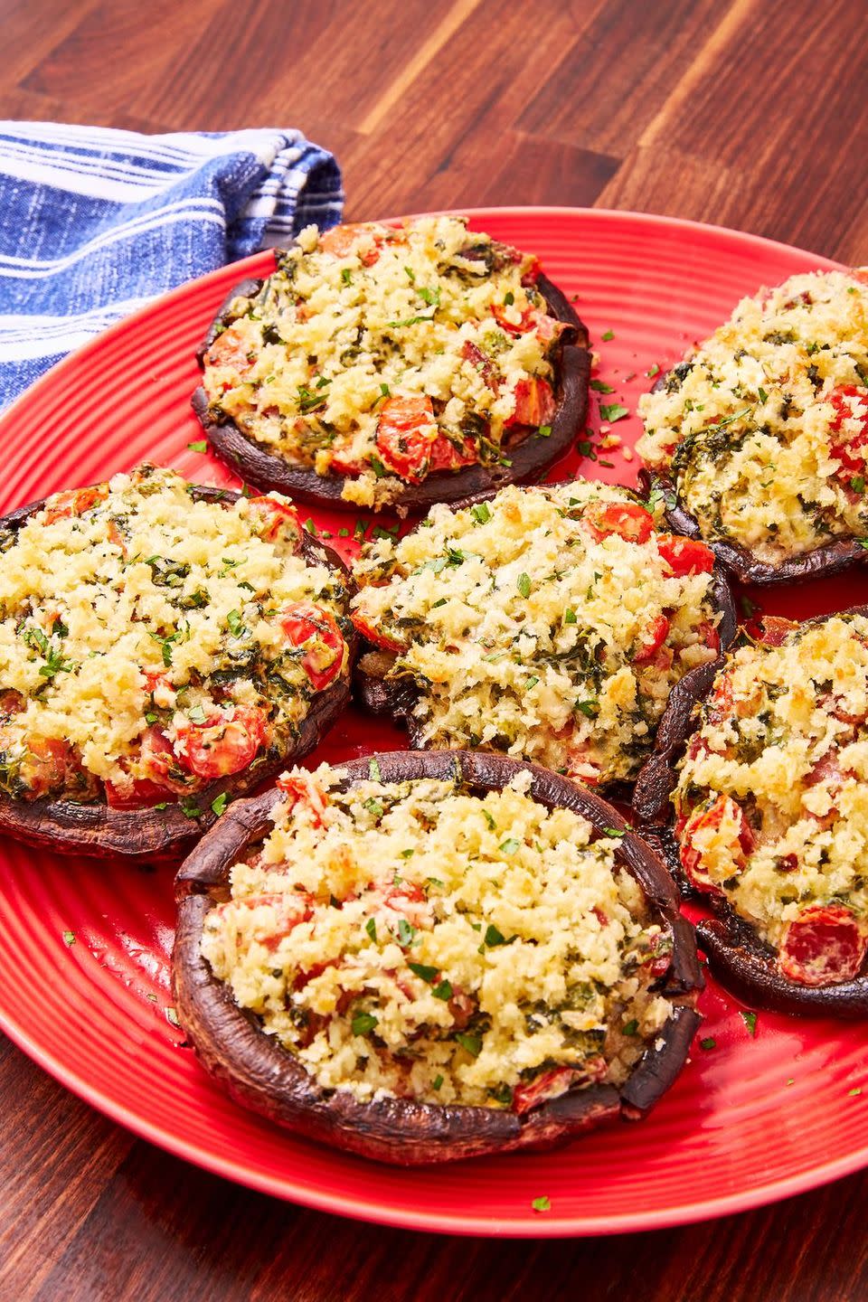<p>This is our take on the classic stuffed portobello mushrooms. It's simple yet insanely delicious. Cream cheese, bacon, and spinach make a classic combo while tomatoes add a pop of freshness. The buttery panko topping just puts it over the top! </p><p>Get the <a href="https://www.delish.com/uk/cooking/recipes/a30451382/stuffed-portobello-mushrooms-recipe/" rel="nofollow noopener" target="_blank" data-ylk="slk:Stuffed Portobello Mushrooms;elm:context_link;itc:0;sec:content-canvas" class="link ">Stuffed Portobello Mushrooms</a> recipe.</p>