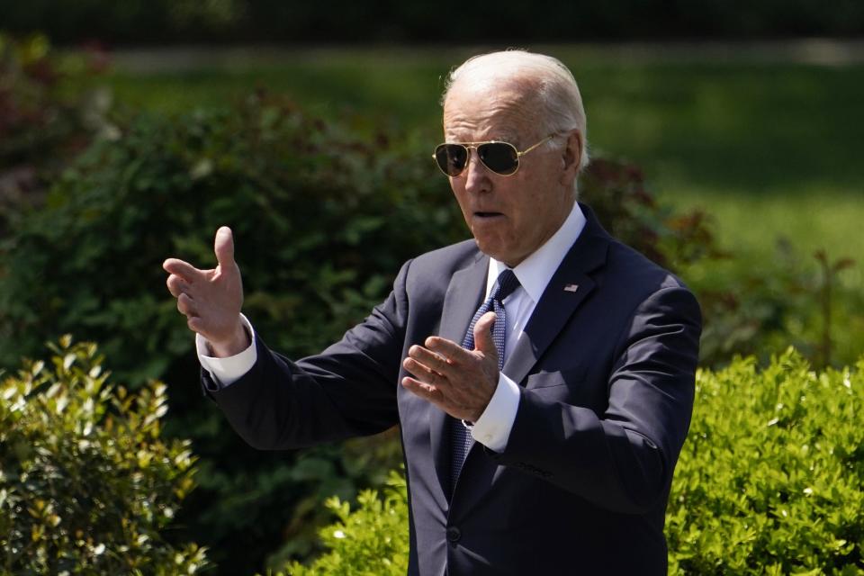 President Joe Biden reacts as he arrives for an event to celebrate the Tampa Bay Lightning's 2020 and 2021 Stanley Cup championships at the White House, Monday. (AP Photo/Andrew Harnik)