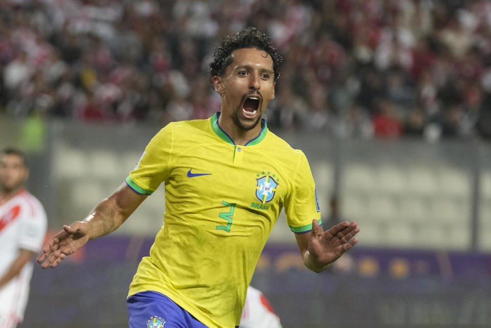 Brazil's Marquinhos celebrates scoring his side's opening goal against Peru during a qualifying soccer match for the FIFA World Cup 2026 at National stadium in Lima, Peru, Tuesday, Sept. 12, 2023. (AP Photo/Martin Mejia)