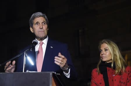 US Secretary of State John Kerry (L), next to US ambassador to France Jane D. Hartley, delivers a speech at the US embassy in Paris on November 16, 2015. REUTERS/Dominique Faget/Pool