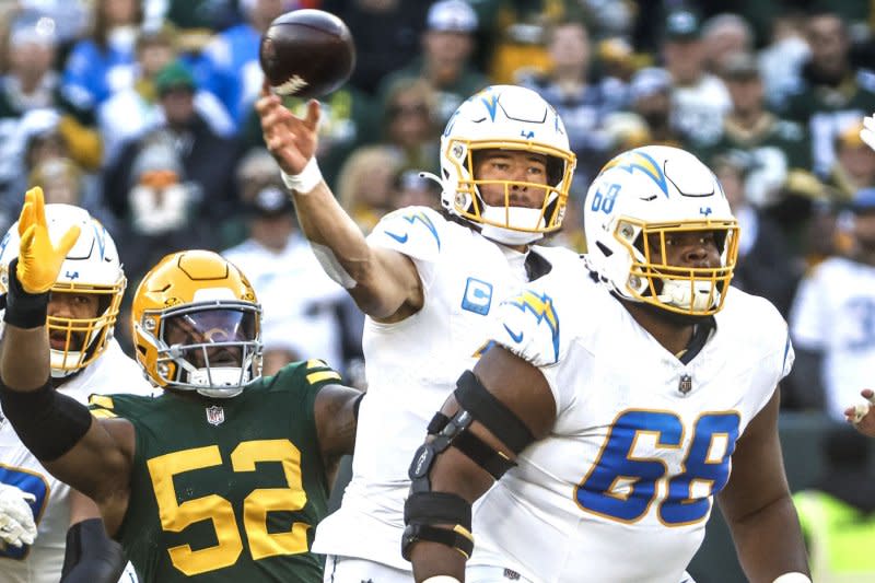 Multiple NFL teams asked the Los Angeles Chargers about the availability of quarterback Justin Herbert (C) this off-season. File Photo by Tannen Maury/UPI