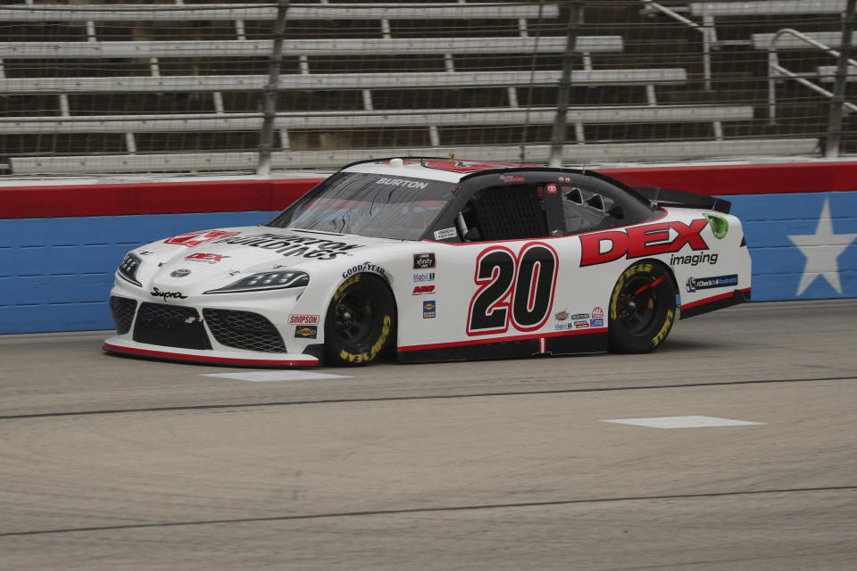 Harrison Burton (20) drives on the front stretch during a NASCAR Xfinity Series auto race at Texas Motor Speedway in Fort Worth, Texas, Saturday Oct. 24, 2020. (AP Photo/Richard W. Rodriguez)