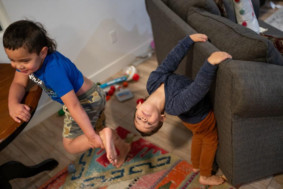 ‘Akalisi “Bubba” Palu, 4, and his brother Joey, 3, horse around at their home in Eagle Mountain on Tuesday, Nov. 28, 2023. | Spenser Heaps, Deseret News