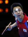 South Korea's Joo Saehyuk serves to Hong Kong's Jiang Tianyi in their men's team semifinals table tennis match at the ExCel venue during the London 2012 Olympic Games August 6, 2012. REUTERS/Darren Staples (BRITAIN - Tags: OLYMPICS SPORT TABLE TENNIS) 