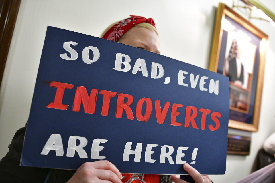 <p>Angie Cook a teacher from Milton W.Va., holds a sign outside the Senate Chambers in the West Virginia Capitol in Charleston, W.Va., Monday, March 5, 2018. (Photo: Tyler Evert/AP) </p>