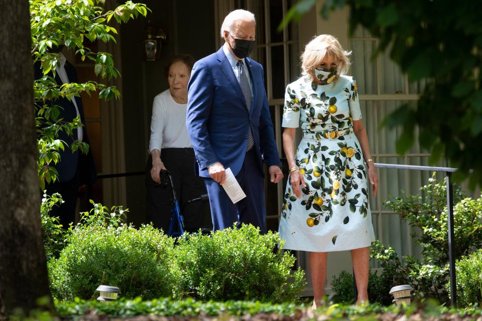 Former First Lady Rosalynn Carter (L) walks US President Joe Biden and US first lady Dr. Jill Biden out after they after visited former US President Jimmy Carter, April 29, 2021, in Plains, GeorgiaAFP via Getty Images