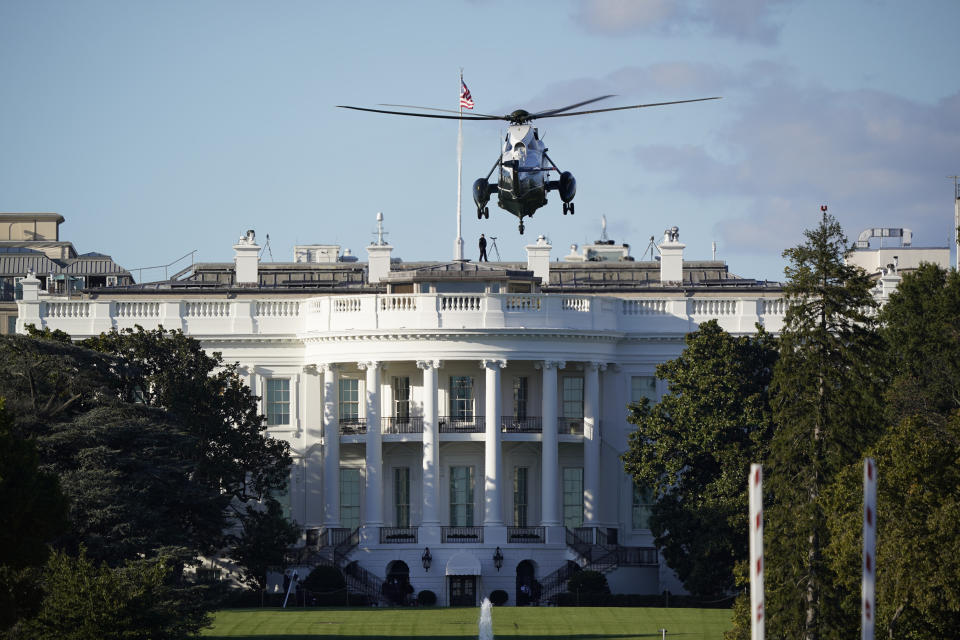 The helicopter that will carry President Donald Trump to Walter Reed National Military Medical Center in Bethesda, Md., lands on the South Lawn of White House in Washington, Friday, Oct. 2, 2020. The White House says Trump will spend a "few days" at the military hospital after contracting COVID-19. (AP Photo/J. Scott Applewhite)