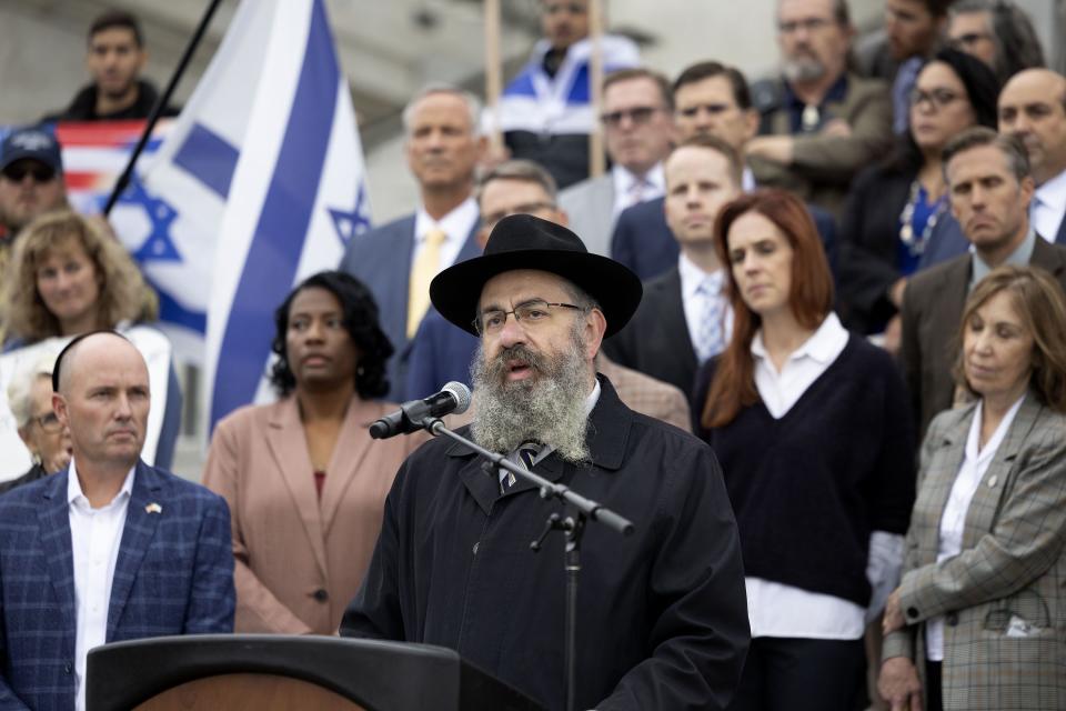 Utah legislators and the governor stand with Rabbi Benny Zippel, Executive Director of Chabad of Utah, as he speaks at the Stand with Israel rally at the Capitol in Salt Lake City on Wednesday, Oct. 11, 2023. | Laura Seitz, Deseret News
