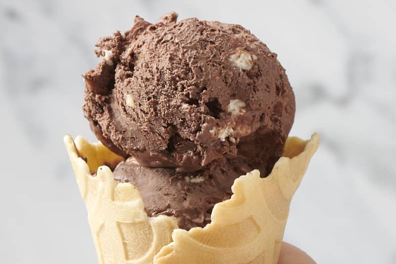 rocky road ice cream in a waffle cone