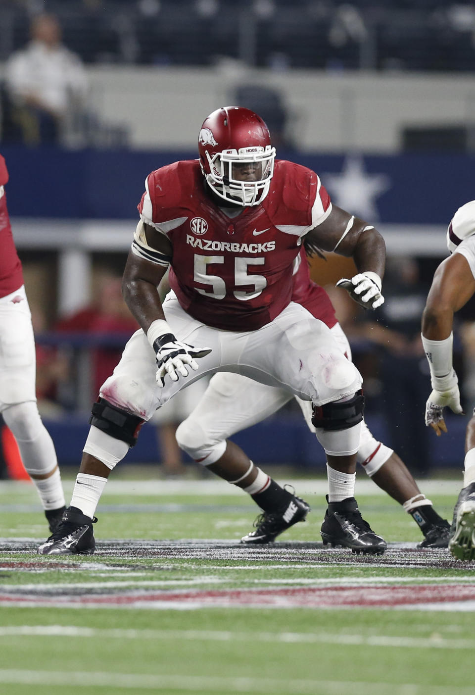 Sep 26, 2015; Arlington, TX, USA; Arkansas Razorbacks tackle Denver Kirkland (55) in action against the Texas A&M Aggies at AT&T Stadium. Mandatory Credit: Matthew Emmons-USA TODAY Sports