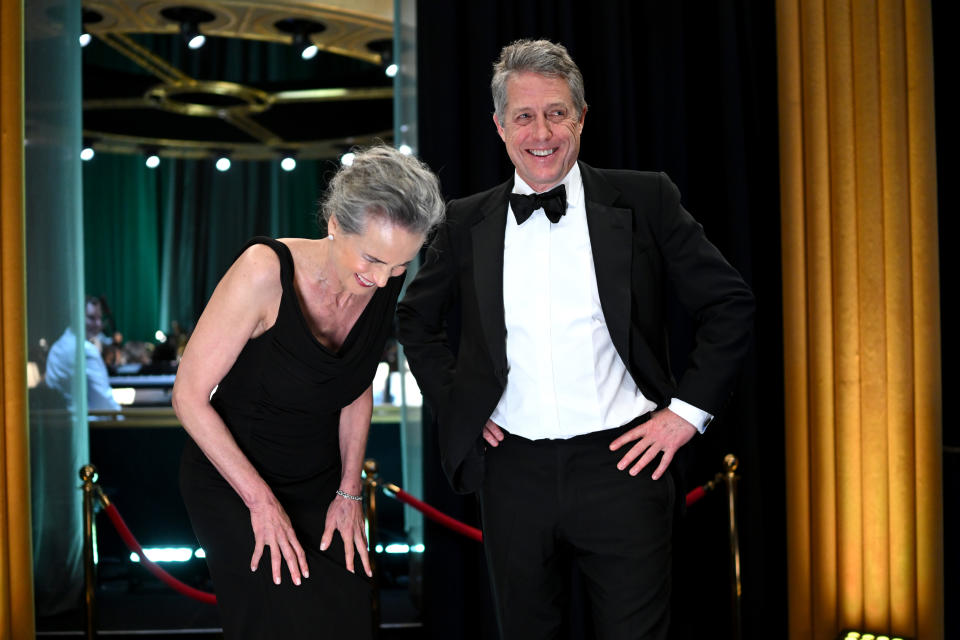 HOLLYWOOD, CALIFORNIA - MARCH 12: In this handout photo provided by A.M.P.A.S., Andie MacDowell and Hugh Grant are seen backstage during the 95th Annual Academy Awards on March 12, 2023 in Hollywood, California. (Photo by Richard Harbaugh/A.M.P.A.S. via Getty Images)