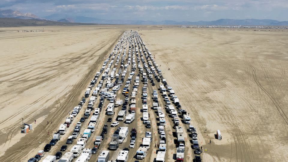 The mass "exodus" from Burning Man officially began Monday afternoon after event organizers lifted a driving ban - Matt Mills McKnight/Reuters