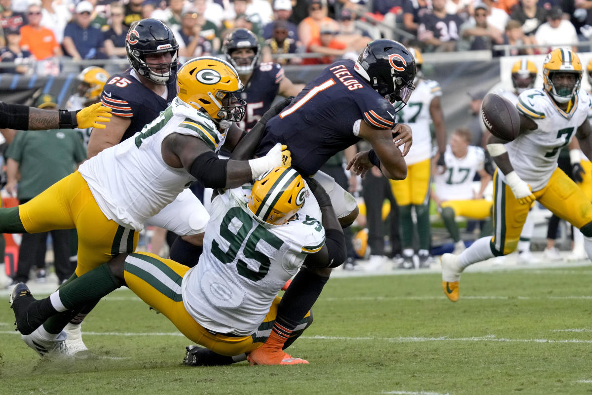 Chicago Bears wide receiver Darnell Mooney tries to break away from  Washington Commanders safety Bobby McCain during the first half of an NFL  football game in Chicago, Thursday, Oct. 13, 2022. (AP